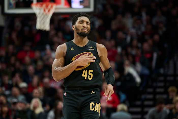 Nov 15, 2023; Portland, Oregon, USA; Cleveland Cavaliers guard Donovan Mitchell (45) reacts after scoring a three point basket during the second half against the Portland Trail Blazers at Moda Center. Mandatory Credit: Troy Wayrynen-USA TODAY Sports